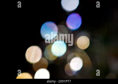 Background created with black unfocused lights Stock Photo