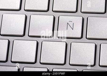 Close up of special letter n of the Spanish alphabet on a grey keyboard of a laptop computer Stock Photo
