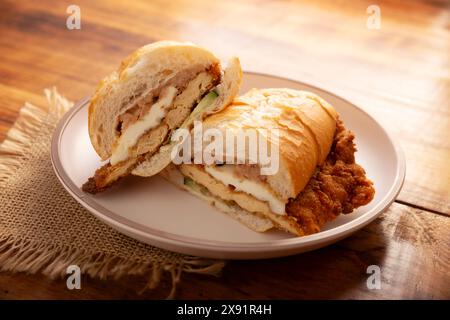 Mexican Torta de Milanesa. Sandwich made with bolillo bread, telera or ...