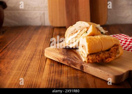 Mexican Torta de Milanesa. Sandwich made with bolillo bread, telera or ...