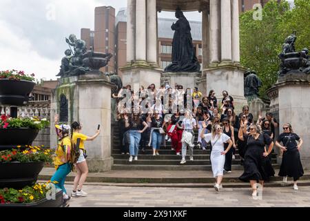 A gathering of young women in Derby Square Liverpool Stock Photo