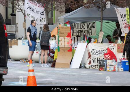 group of people at an anti-Israel pro-Palestinian protest encampment on the campus of the Fashion Institute of Technology on April 29, 2024 Stock Photo