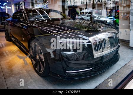 British black luxury limousine Rolls-Royce Phantom VIII with four-wheel steering, manufactured Rolls-Royce Motor Cars automobile manufacturer auto sal Stock Photo