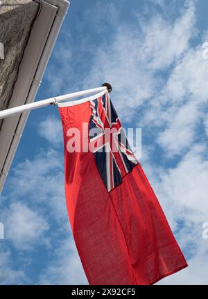 The Red Ensign or 'Red Duster' flag flown on British merchant shipping. Stock Photo