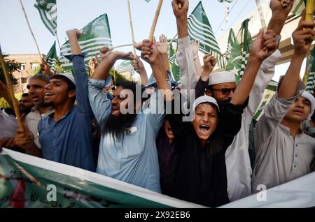 Peshawar, Peshawar, Pakistan. 28th May, 2024. Pakistan remembers nuclear tests day of 1998 in Peshawar.Supporters of Pakistan Markazi Muslim League take part in a rally during 'Youm-e-Takbeer' day in Peshawar, Pakistan, 28 May 2024. Youm-e-Takbeer is observed, in remembrance of Pakistan's nuclear tests conducted on 28 May 1998. Pakistan was on that day the seventh nuclear nation in the world and the first one as a Muslim state. (Credit Image: © Hussain Ali/ZUMA Press Wire) EDITORIAL USAGE ONLY! Not for Commercial USAGE! Stock Photo