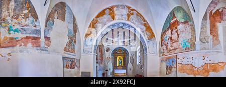 LOCARNO, SWITZERLAND - MARCH 26, 2022: Panorama of the medieval prayer hall of Annunziata Church with preserved fresco traces on walls, Locarno, Switz Stock Photo