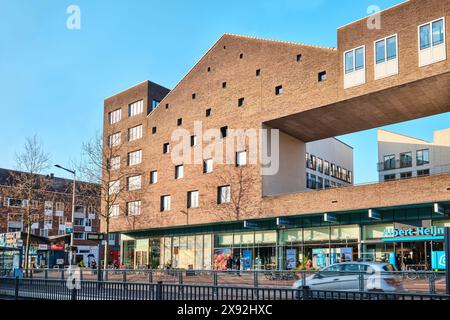 Netherlands, Amsterdam - April 10, 2024: Ijburg district downtown center with brick facade modern architecture Stock Photo