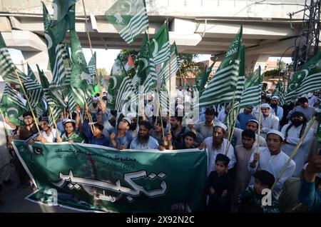 Peshawar, Peshawar, Pakistan. 28th May, 2024. Pakistan remembers nuclear tests day of 1998 in Peshawar.Supporters of Pakistan Markazi Muslim League take part in a rally during 'Youm-e-Takbeer' day in Peshawar, Pakistan, 28 May 2024. Youm-e-Takbeer is observed, in remembrance of Pakistan's nuclear tests conducted on 28 May 1998. Pakistan was on that day the seventh nuclear nation in the world and the first one as a Muslim state. (Credit Image: © Hussain Ali/ZUMA Press Wire) EDITORIAL USAGE ONLY! Not for Commercial USAGE! Stock Photo