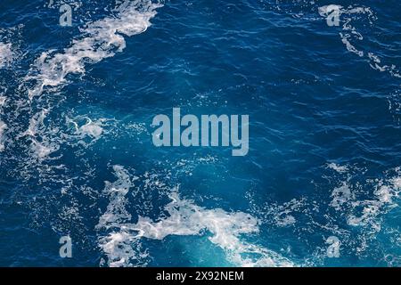 Foam ad waves, blue ocean surface, abstract background Stock Photo