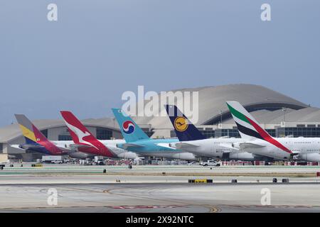 Five Airbus A380 line-up at the gate shown at the Bradley Terminal in LAX, Los Angeles International Airport. Stock Photo