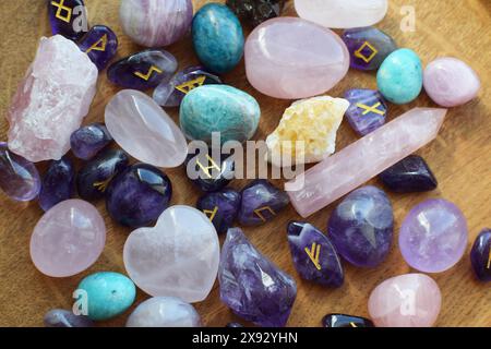 Scandinavian amethyst runes and semi-precious stone crystals. Predictions, witchcraft, spiritual esoteric practice. Stock Photo