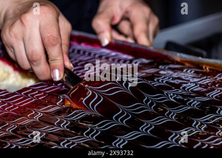 Chef prepares trilece dessert in the kitchen. Turkish Traditional ...