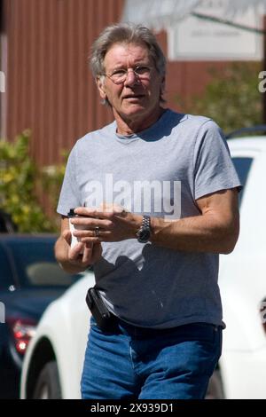 Harrison Ford stop in Brentwood to take a coffee,he is really good looking and in great shape.  In brentwood,Califonia on March 08, 2011 Stock Photo