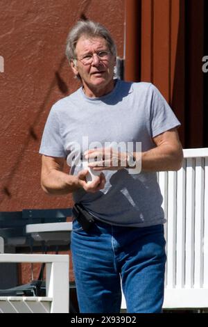 Harrison Ford stop in Brentwood to take a coffee,he is really good looking and in great shape.  In brentwood,Califonia on March 08, 2011 Stock Photo