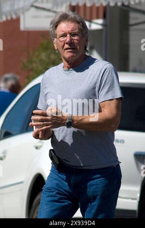 Harrison Ford stop in Brentwood to take a coffee,he is really good looking and in great shape.  In brentwood,Califonia on March 08, 2011 Stock Photo