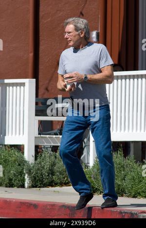 Harrison Ford stop in Brentwood to take a coffee,he is really good looking and in great shape.  In brentwood,Califonia on March 08, 2011 Stock Photo