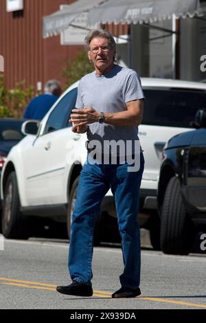 Harrison Ford stop in Brentwood to take a coffee,he is really good looking and in great shape.  In brentwood,Califonia on March 08, 2011 Stock Photo