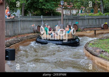 Park guests ride the Smoky Mountain River Rampage at the Dollywood amusement park in Pigeon Forge, TN Stock Photo