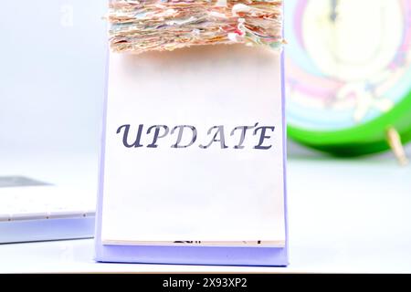 Business concept. UPDATE Word the inscription on the calendar with tear-off leaves Stock Photo