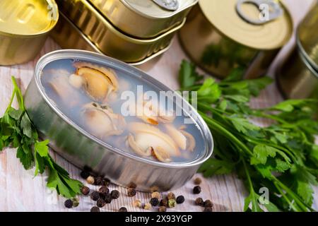 Canned seafood, whole shelled clams Stock Photo