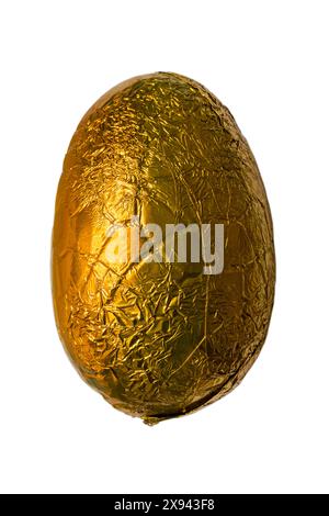 Nestlé Nestle Rolo Easter Egg foil wrapped isolated on white background, hollow milk chocolate egg Stock Photo