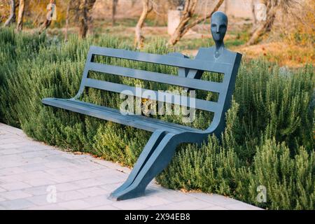 Modern bench in a public park. Stock Photo