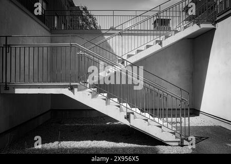 View of a staircase in black and white Stock Photo