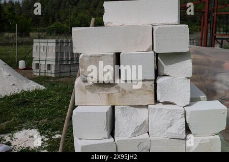 Aerated lightweight gypsum building concrete blocks prepared for building wall modular building house. New Architecture concept. Stock Photo