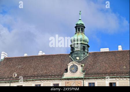 Historical Clock Tower of Amalienburg in Hofburg Palace, Vienna, Austria Stock Photo