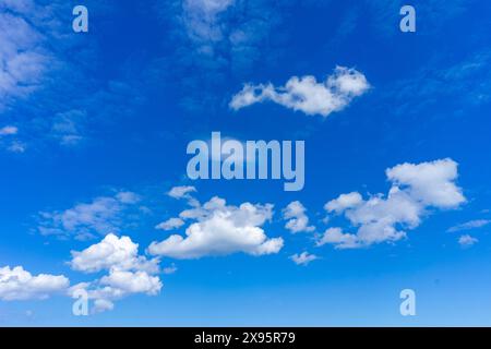 Fleecy clouds with blue sky, Texture background Stock Photo