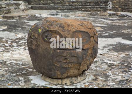 Caved Stone Head made by Indigenous People, Archaeological Zone of Cholula, Cholula, State of Puebla, Mexico, North America Stock Photo