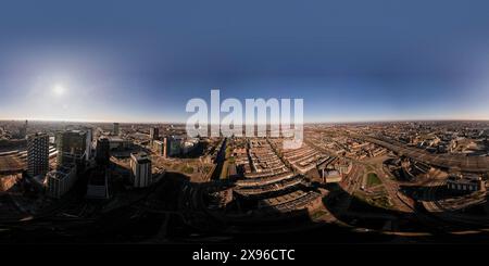 Super wide panoramic aerial view Dutch centre of Utrecht with high rise buildings of financial district infrastructure hub towering over the city Stock Photo