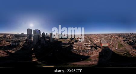 Super wide panoramic aerial view Dutch centre of Utrecht with high rise buildings of financial district infrastructure hub towering over the city Stock Photo