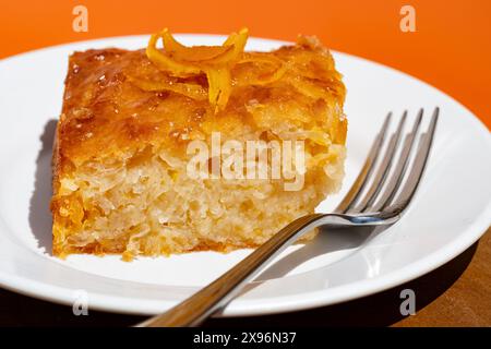 Authentic Greek Orange Pie. This is a Greek specialty known as Portokalopita. Its made with phyllo pastry and soaked in an orange syrup Stock Photo