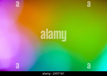 Colorful  glowing abstract background in green pink orange and aqua defocused contemporary backdrop Stock Photo