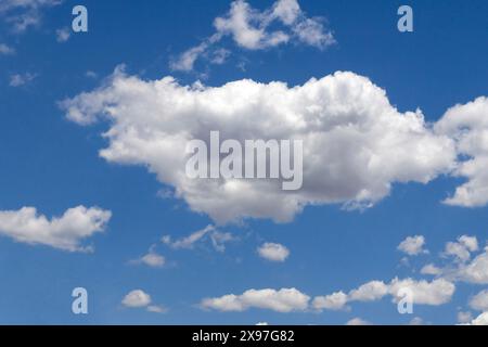 White clouds cumulus in front of blue sky, international Stock Photo
