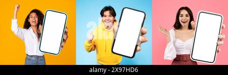 Amazed multiethnic people showing smartphones with blank screens Stock Photo