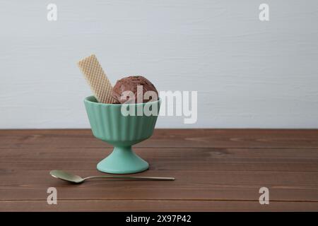 chocolate ice cream with wafer on dessert cup isolated on table Stock Photo