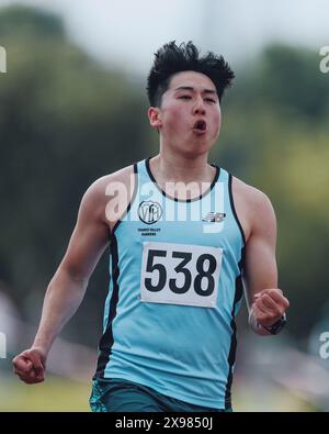 Stratford, United Kingdom. 26 May, 2024. Ka-Hunt To of South London Harriers after winning Round 2 Heat 25 in the 100mM at the 2024 Stratford Speed Grand Prix. Credit: George Tewkesbury/Alamy Live News Stock Photo