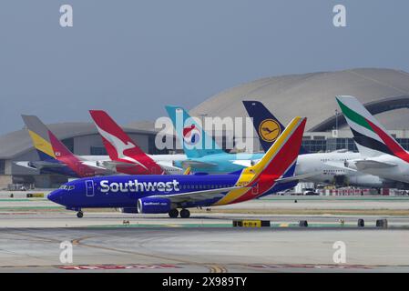 Southwest Airlines Boeing 737 shown taxiing by Terminal B, LAX, Los Angeles International Airport in California on May 27, 2024. Stock Photo