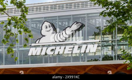 Sign and logo on the Michelin headquarters building. Michelin is a French multinational company and one of the world leaders in tire manufacturing Stock Photo