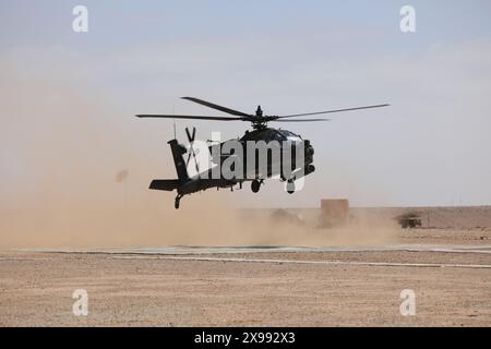 A U.S. Army AH-64D Apache Longbow assigned to Alpha Company, 1st Attack/Reconnaissance Battalion, 211th Aviation Regiment, 97th Aviation Troop Command Stock Photo