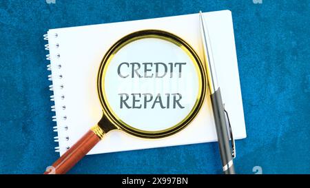 Business concept. The inscription - CREDIT REPAIR through a magnifying glass on a blank sheet on a blue background Stock Photo