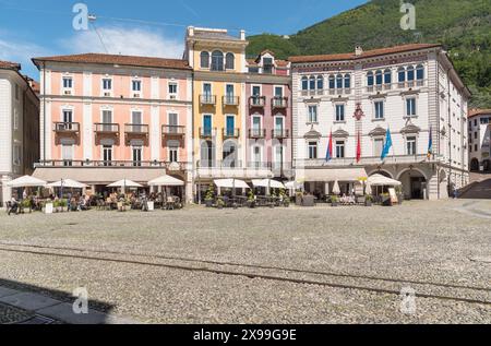 Locarno, Ticino, Switzerland - May 27, 2024: View of the famous Piazza Grande with typical arcades in the historic center of Locarno. Stock Photo