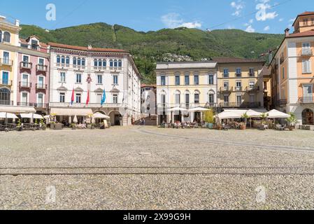 Locarno, Ticino, Switzerland - May 27, 2024: View of the famous Piazza Grande with typical arcades in the historic center of Locarno. Stock Photo