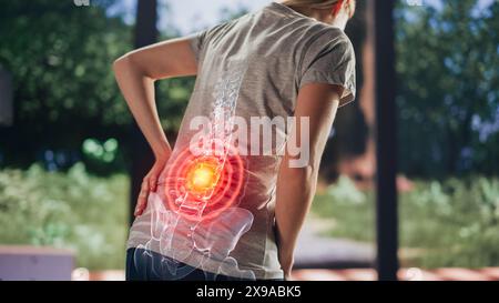 VFX Back Pain Augmented Reality Render. Close Up of a Female Experiencing Discomfort in a Result of Spine Trauma or Arthritis. Massaging and Stretching the Back to Ease the Injury. Stock Photo