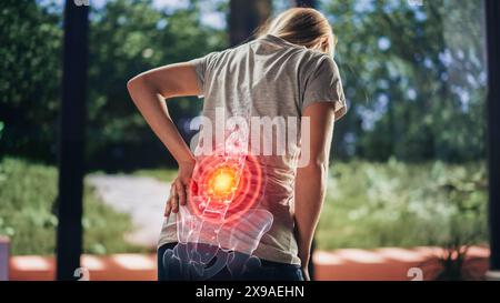 VFX Back Pain Augmented Reality Render. Close Up of a Female Experiencing Discomfort in a Result of Spine Trauma or Arthritis. Massaging and Stretching the Back to Ease the Injury. Stock Photo