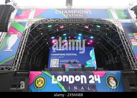 London, UK, 30th May 2024. The UEFA Champions League Festival started in Trafalgar Square with Mikel John Obi, UEFA ambassador bringing the trophy on stage and London Mayor Sadiq Khan joining in a kickabout.  The festival builds up to Saturday's final at Wembley between Borussia Dortmund and Real Madrid. Credit : Monica Wells/Alamy Live News Stock Photo