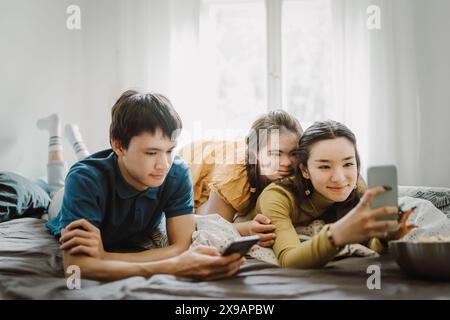 Down syndrome woman at home using computer laptop stressed with hand on ...