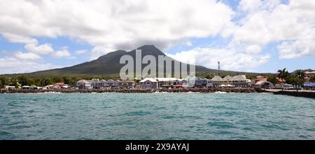 Nevis is the smaller of the 2 islands comprising the nation of Saint Kitts and Nevis in the Caribbean. It has a potentialy active volcano seen here ab Stock Photo